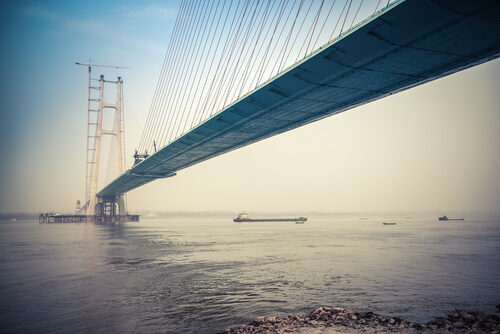 standing on bridge shutterstock_124603273.jpg